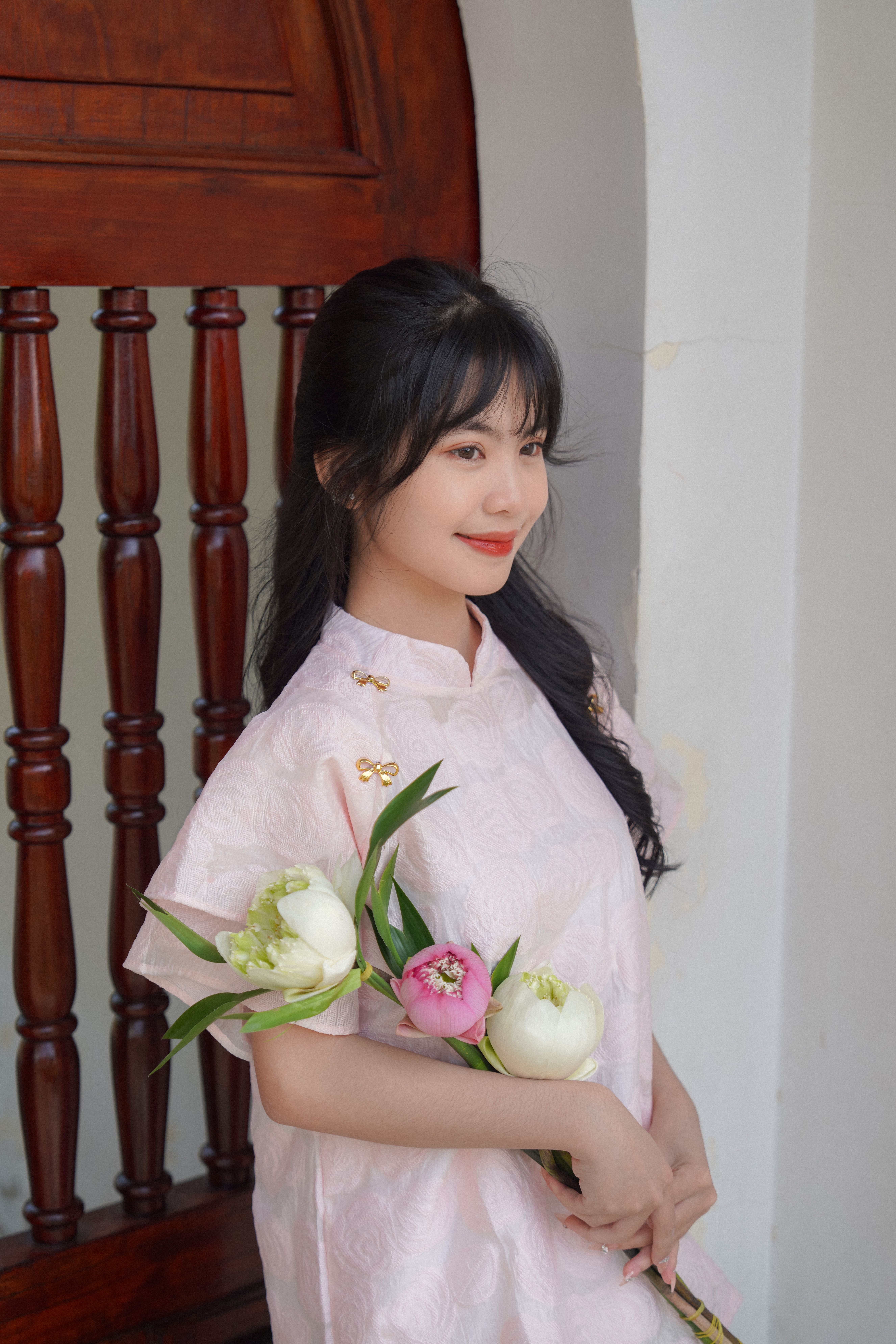 Portrait of Woman with Flowers in Traditional Dress · Free Stock Photo