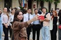 Group of Young Adults Taking a Selfie Outdoors
