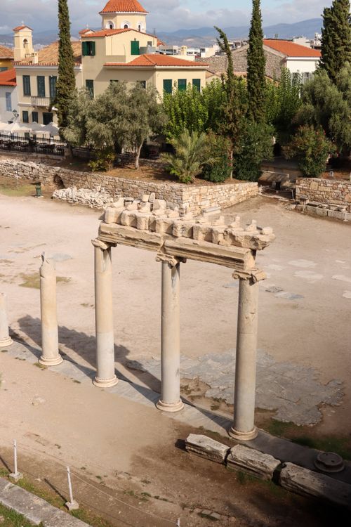 Free Aerial view of ancient Greek columns amidst historical architecture in Athens, Greece. Stock Photo