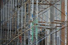 Detailed view of metal scaffolding on a construction site, showcasing architectural complexity.