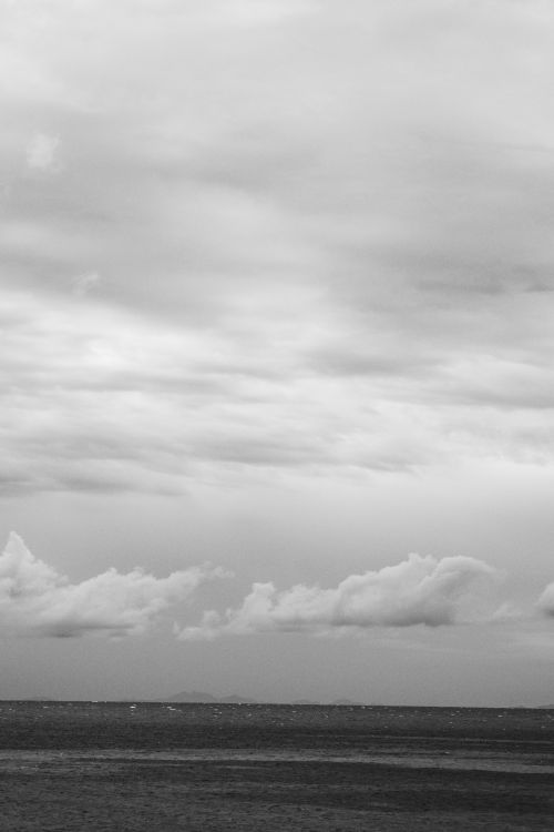 Free stock photo of atmospheric sky, black and white photography, cloudy ocean Stock Photo