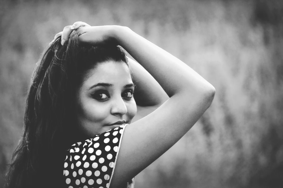 Expressive black and white portrait capturing the soulful eyes of a woman in Rangamati, Bangladesh.