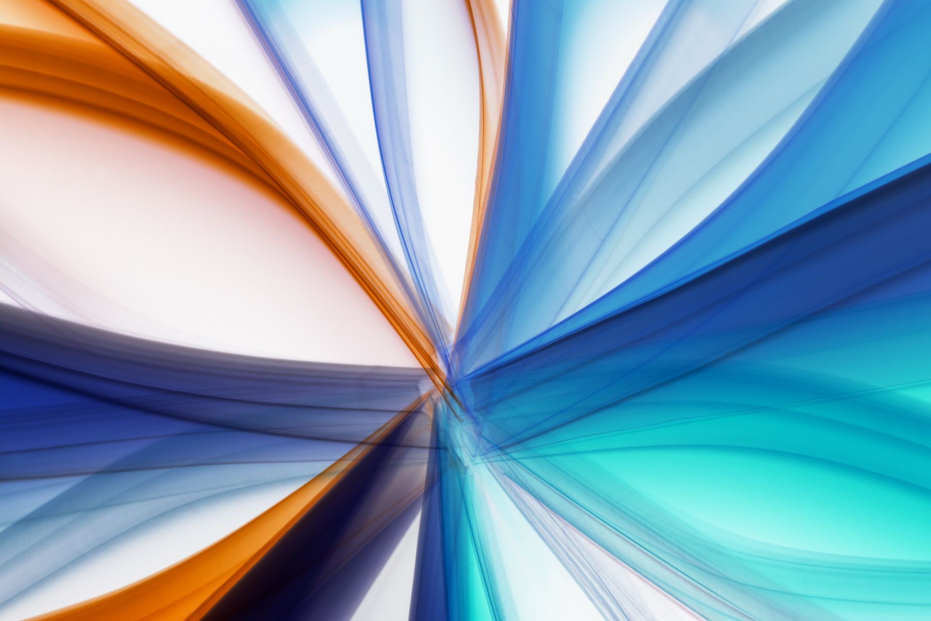 Dynamic abstract art featuring vibrant blue and orange light streaks on a white background.