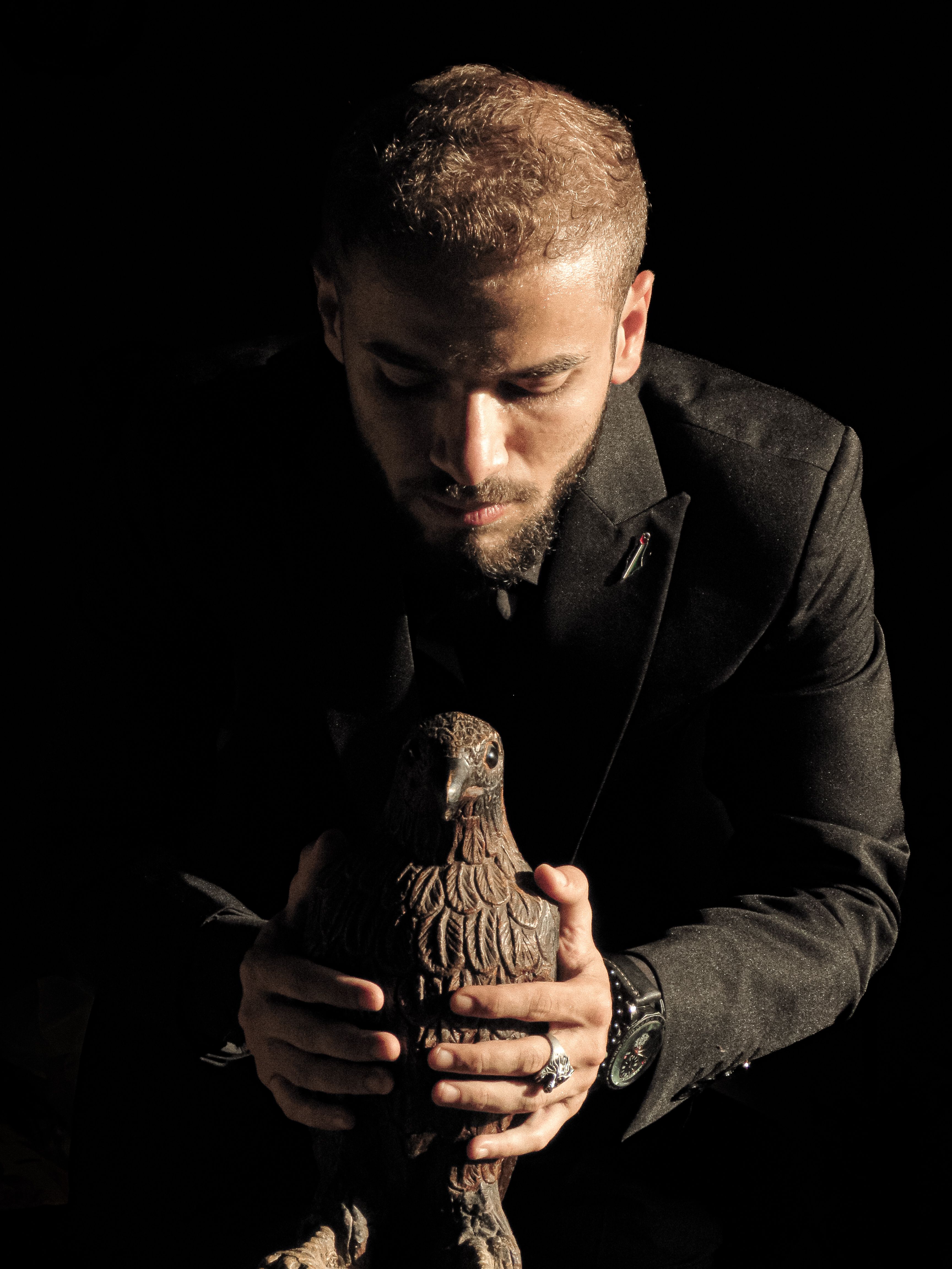 Dramatic Portrait with Eagle Figurine