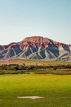 Vivid landscape capturing the colorful hills of Nallıhan, Ankara, with vibrant greenery in the foreground.