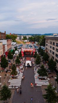 Aerial shot of an outdoor event in Chattanooga, Tennessee featuring a concert setup with seating and stage.