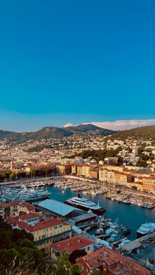 Free Stunning aerial view of the Nice harbor with yachts and colorful buildings in the French Riviera. Stock Photo