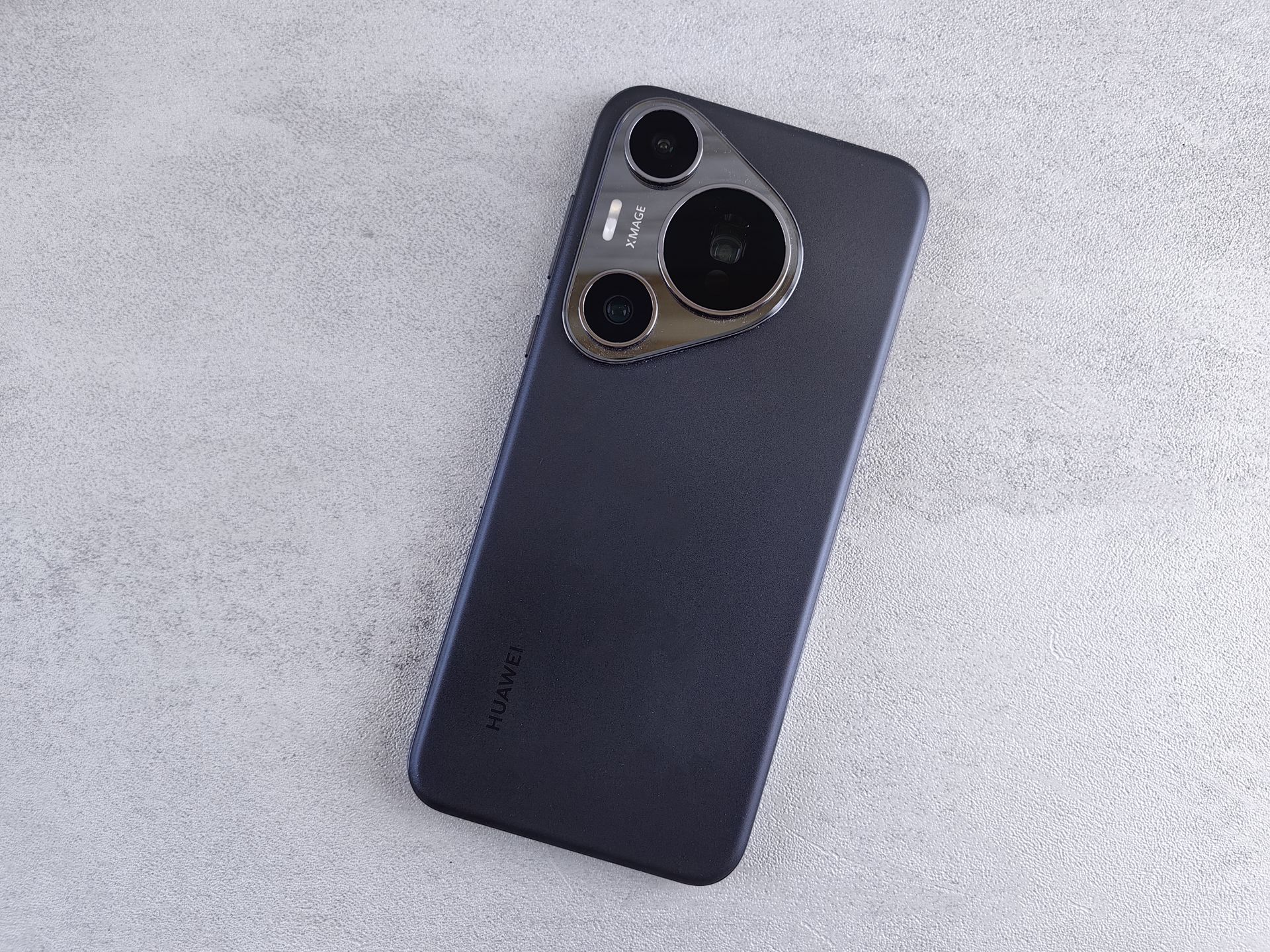 A modern smartphone showcasing a sleek design on a minimalist background.