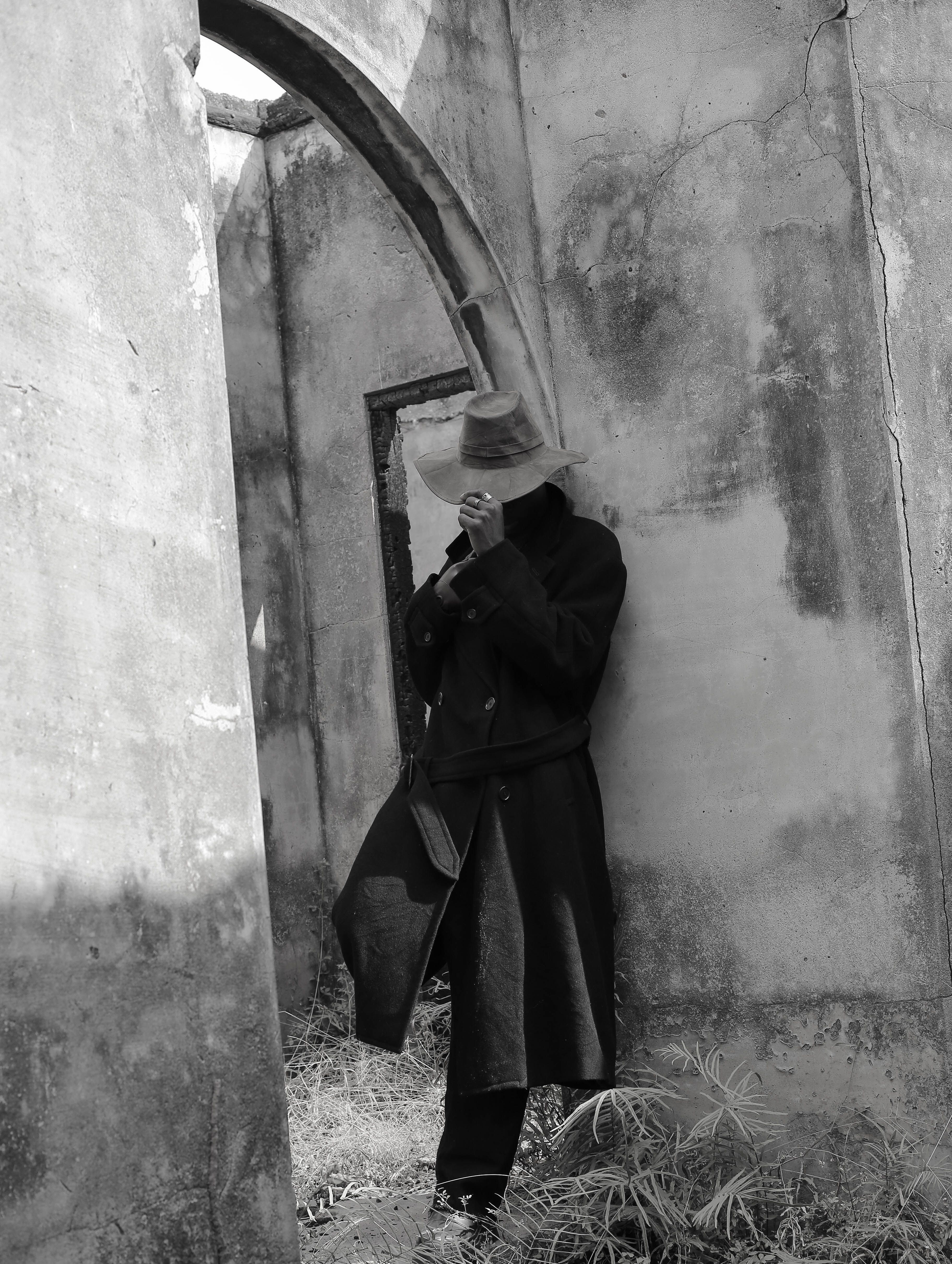 Mysterious Figure in Vintage Black and White Scenery · Free Stock Photo