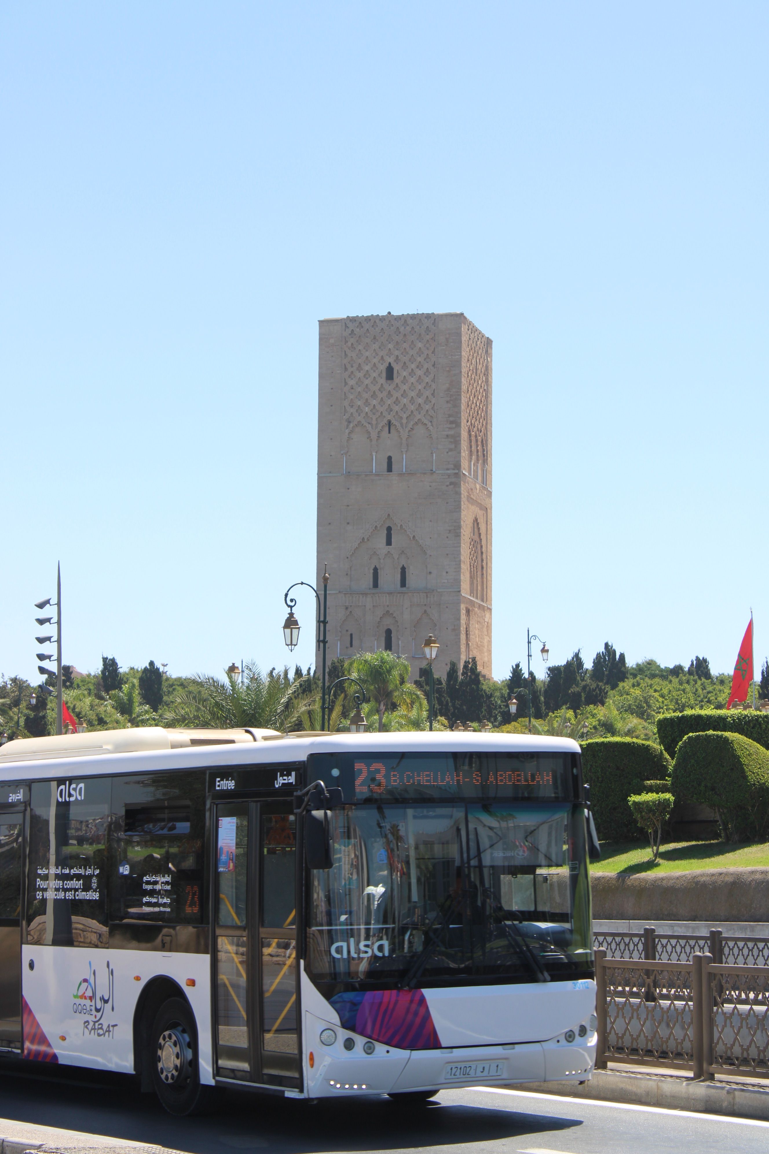 City Bus with Hassan Tower in Rabat, Morocco · Free Stock Photo