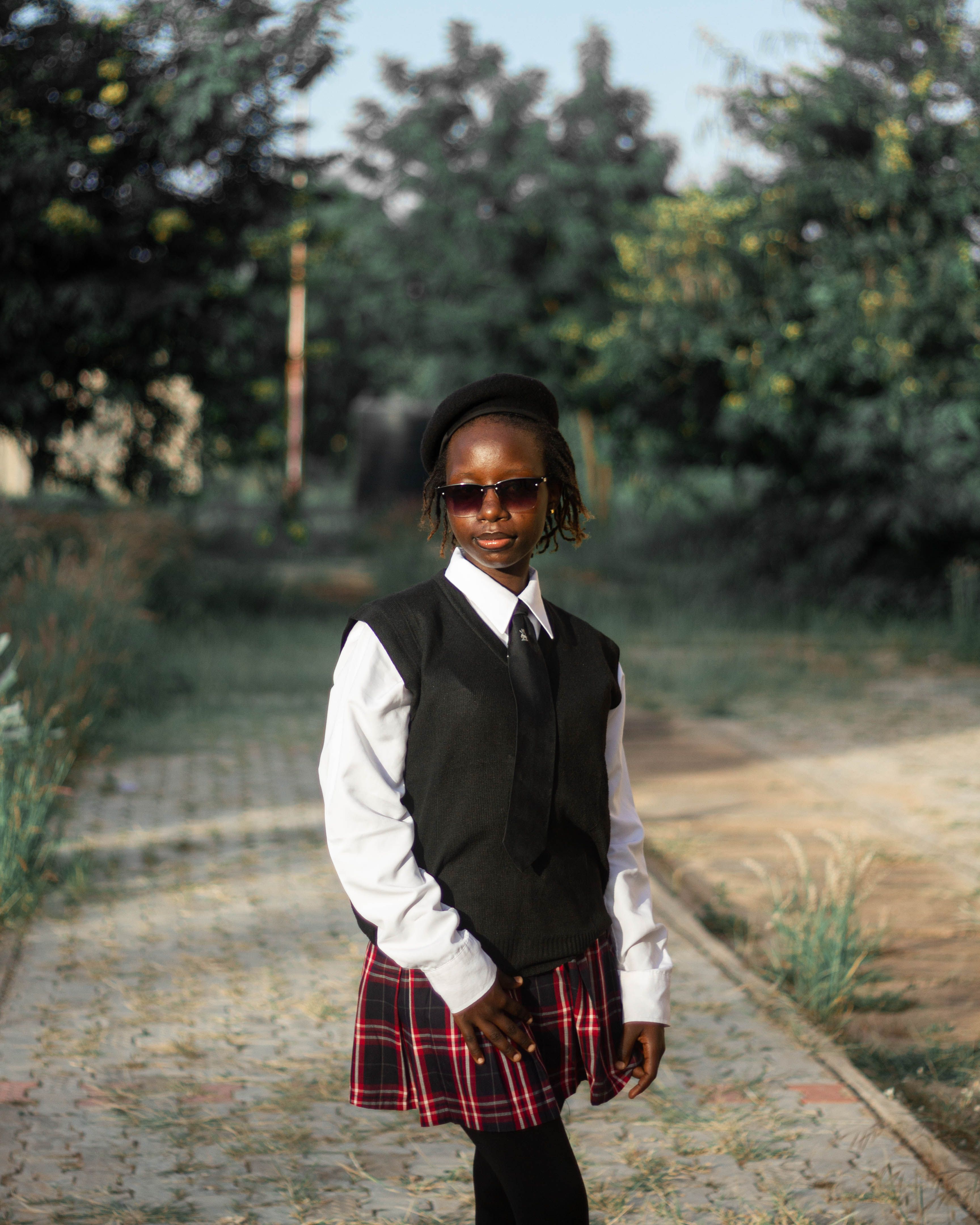 Stylish Young Girl in School Uniform Outdoors · Free Stock Photo