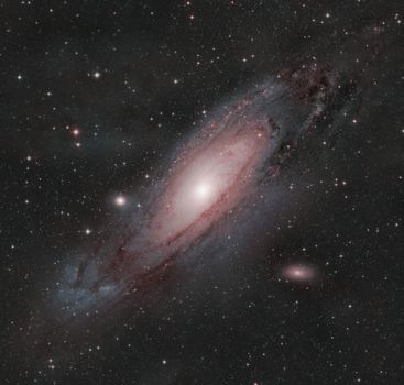 Captivating image of the Andromeda Galaxy surrounded by countless stars in the night sky.