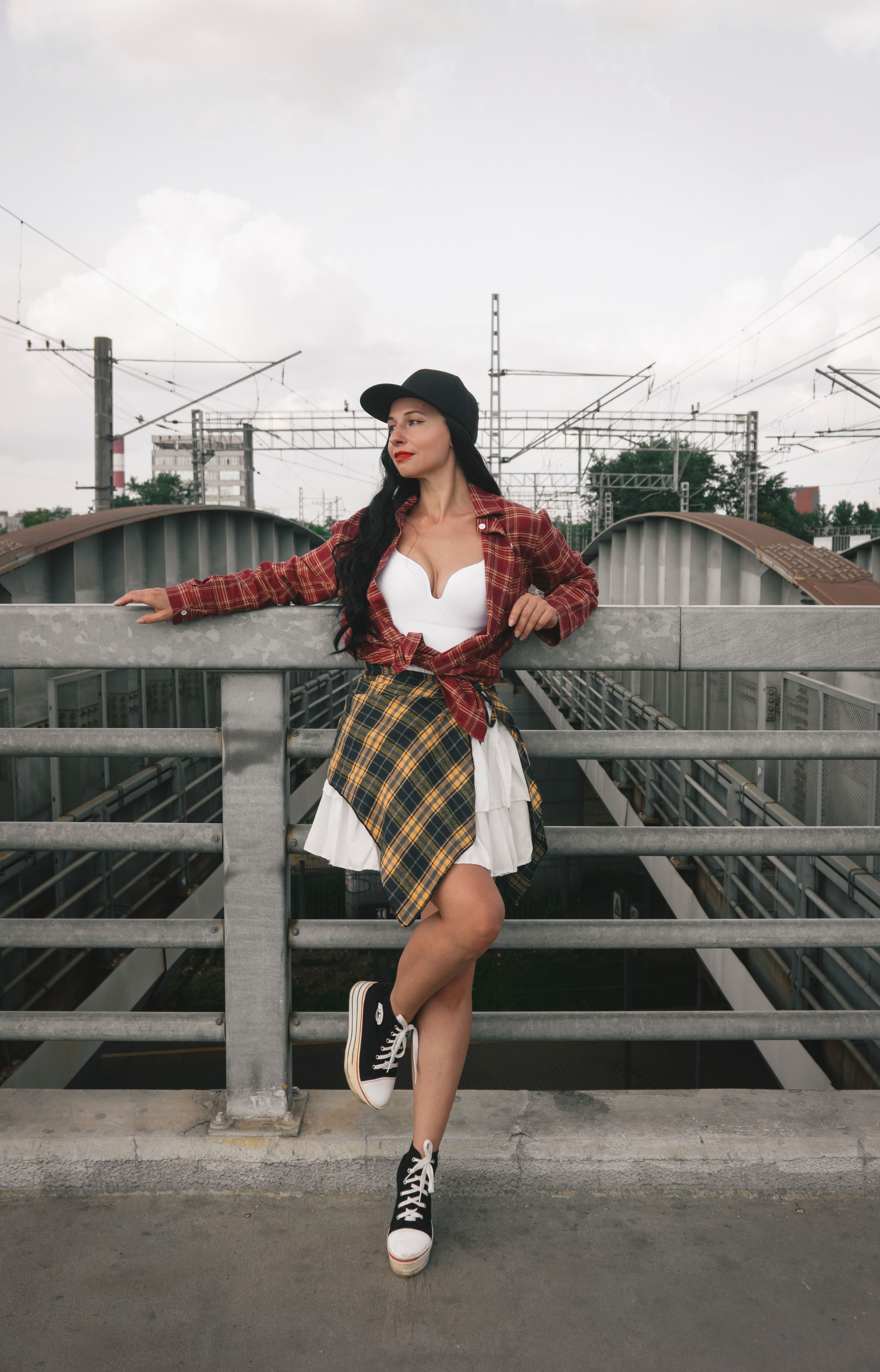 Stylish Woman Posing on Urban Bridge · Free Stock Photo