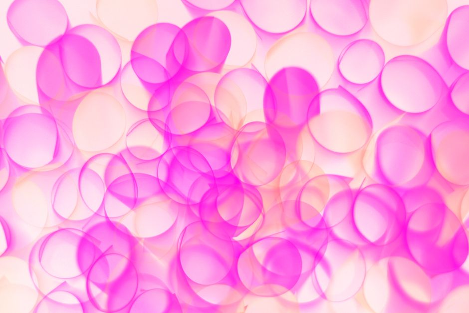 Vibrant abstract image of overlapping pink bubbles creating an airy, artistic effect.