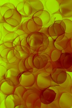 Colorful abstract art featuring overlapping translucent circles with warm tones.
