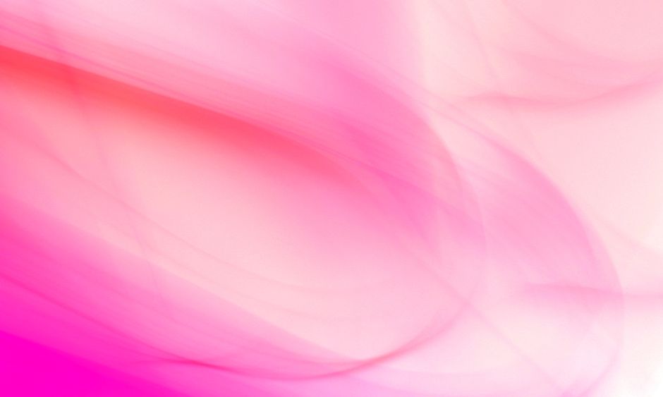 Abstract image featuring flowing pink and peach hues creating a soft, dreamy effect.