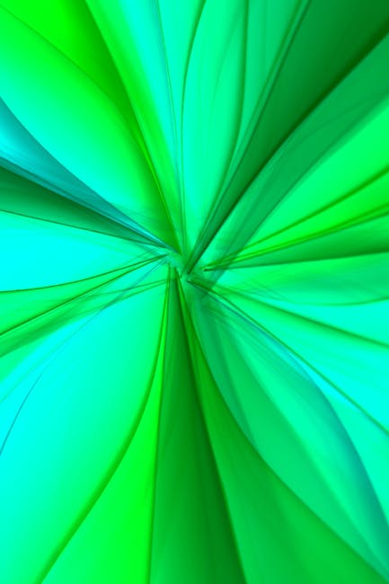 Abstract green pattern with flowing lines and gradient tones, perfect for creative design projects.
