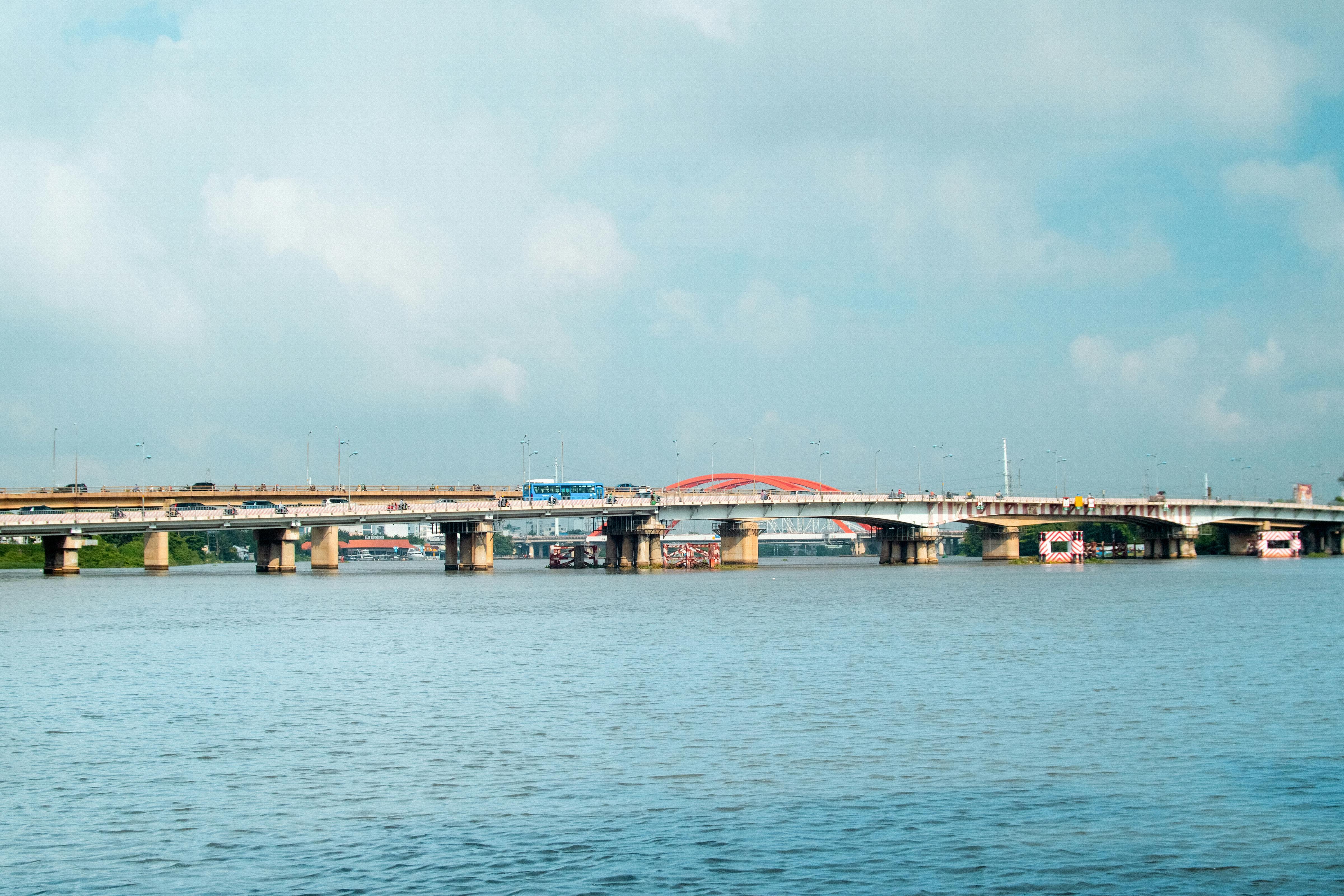 Scenic view of Thi Nghe Bridge spanning over the Saigon River, Ho Chi Minh City, Vietnam.