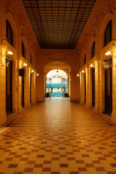 Elegant indoor arcade in Zagreb showcasing traditional Croatian architecture with warm lighting.