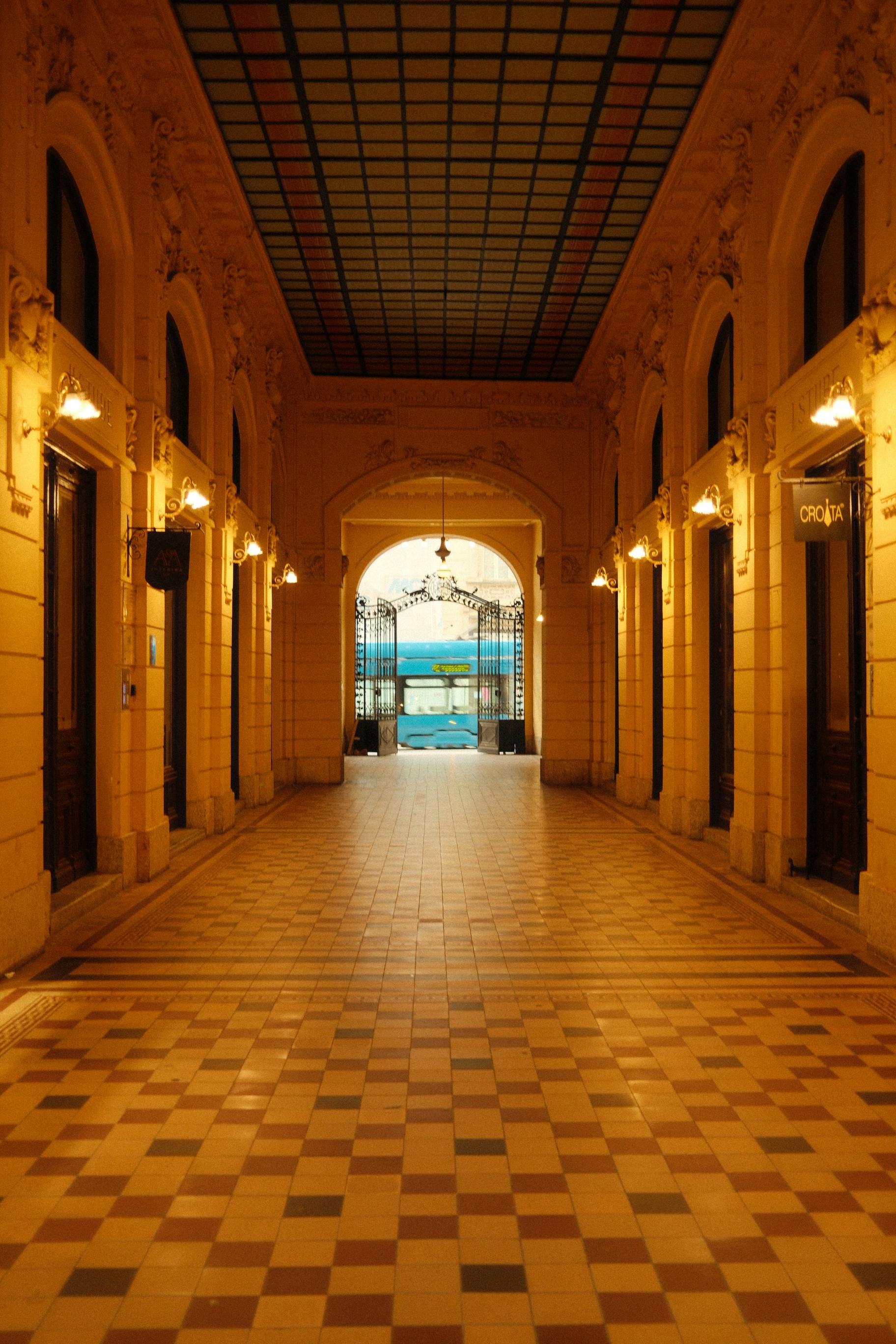 Free Elegant indoor arcade in Zagreb showcasing traditional Croatian architecture with warm lighting. Stock Photo