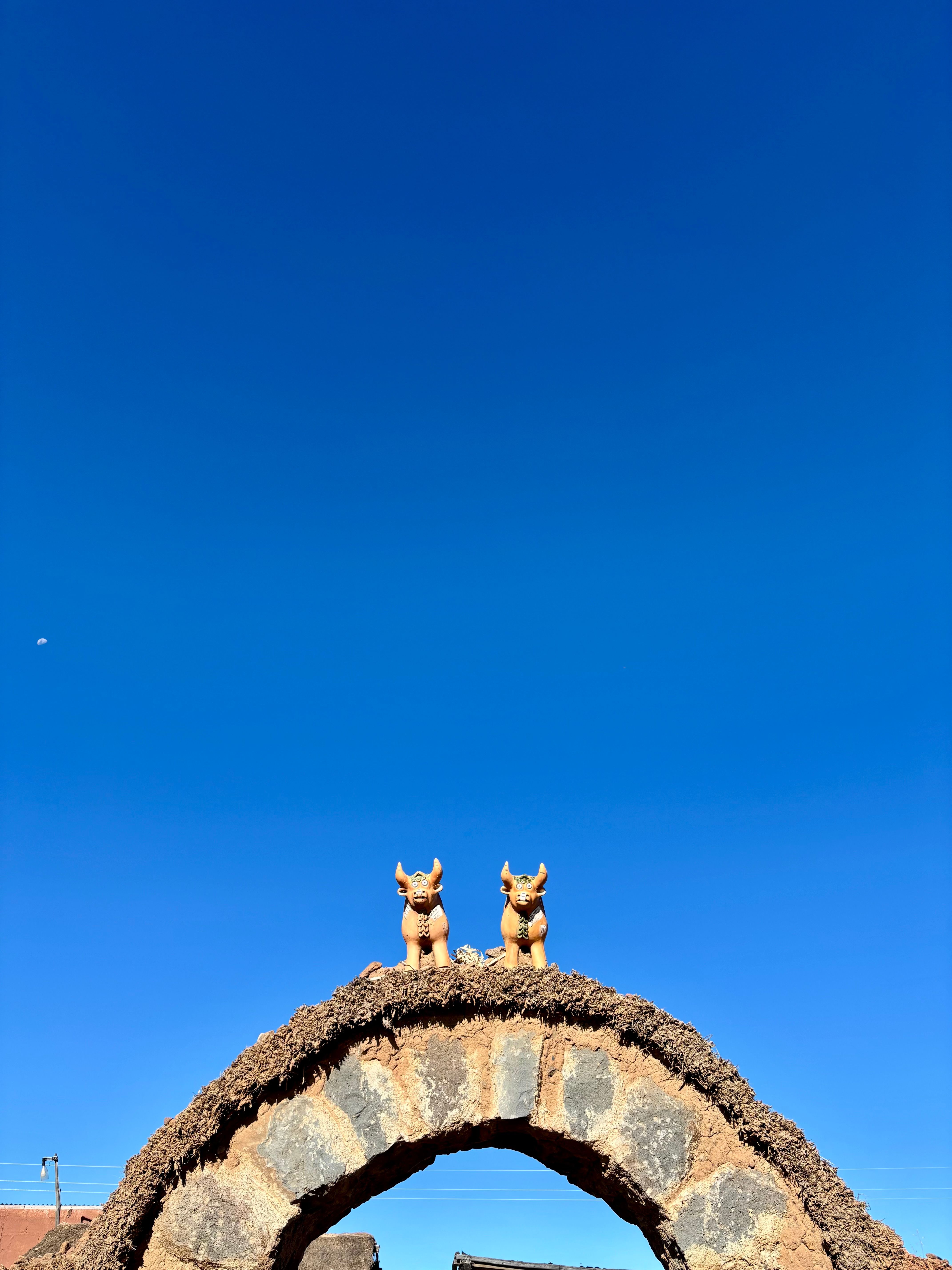 Decorative Arch at Taquile Island with Taurus Figurines · Free Stock Photo