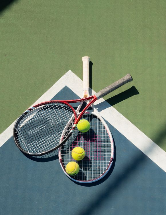 Field Tennis Rackets Tennis Rackets and Balls on Court · Free Stock Photo