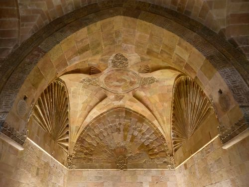 Free Detailed stone ceiling with intricate patterns in historical architecture. Stock Photo