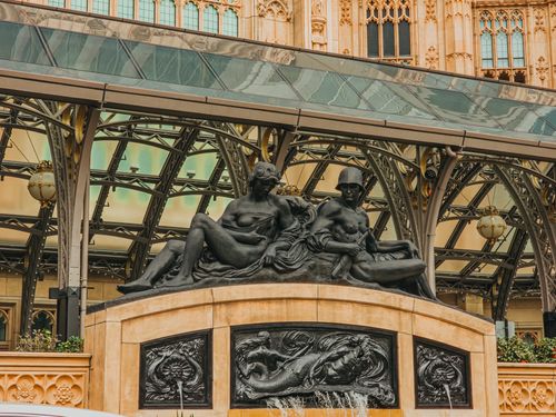 Free Intricate sculpture at Grand Lisboa entrance in Macao offers architectural elegance. Stock Photo