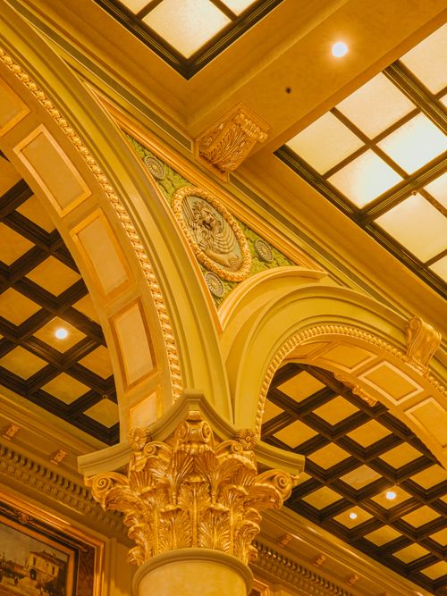 Free Intricate architectural elements of a casino ceiling in Macao capture a luxurious ambiance. Stock Photo