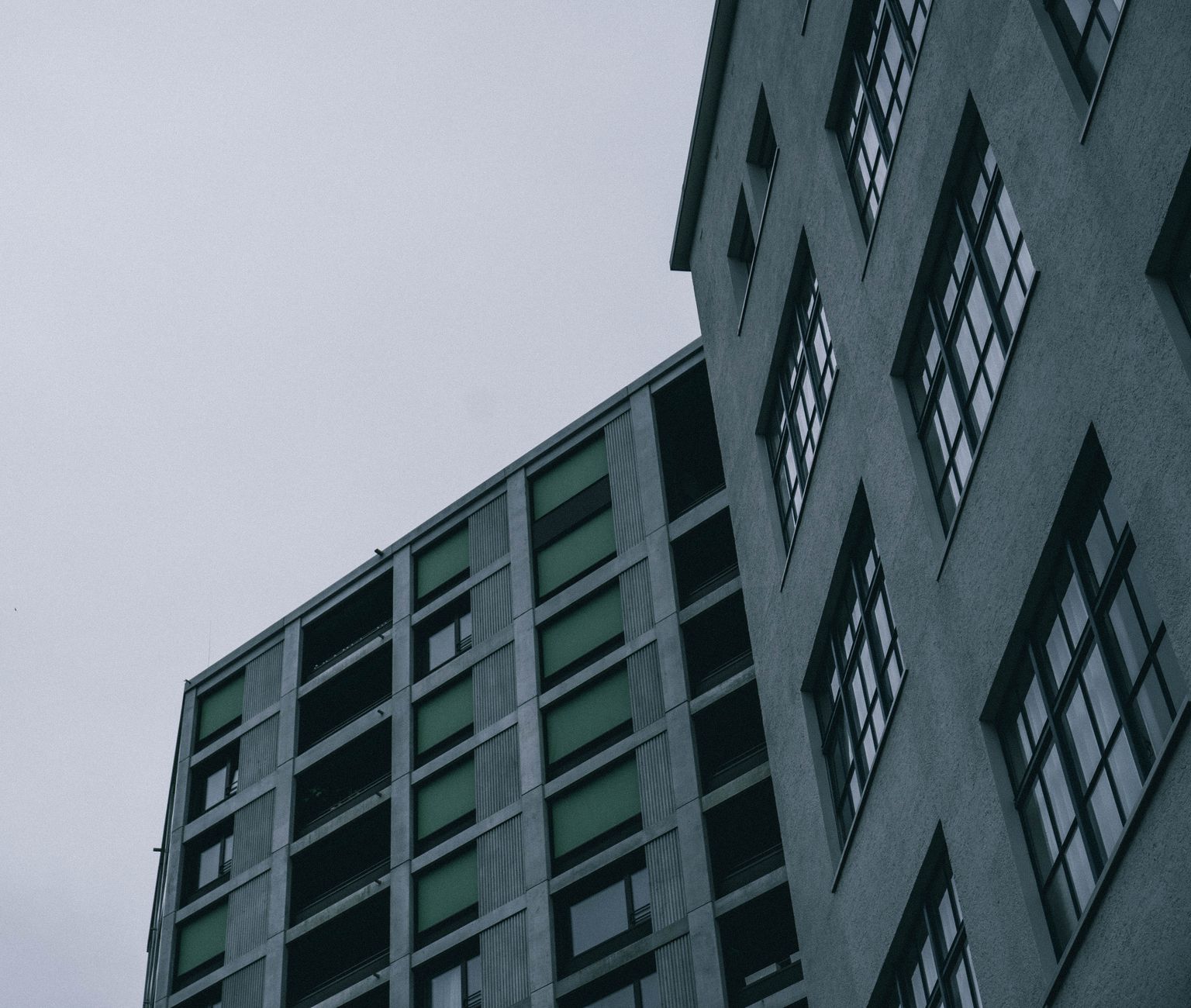 Gloomy view of modern buildings in Neuhausen am Rheinfall, Switzerland.