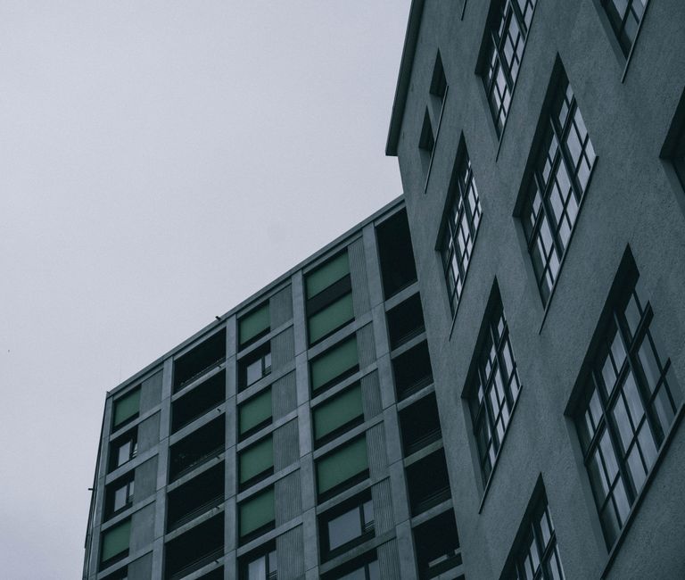 Gloomy view of modern buildings in Neuhausen am Rheinfall, Switzerland.