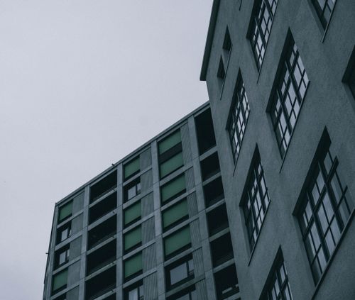 Free Gloomy view of modern buildings in Neuhausen am Rheinfall, Switzerland. Stock Photo
