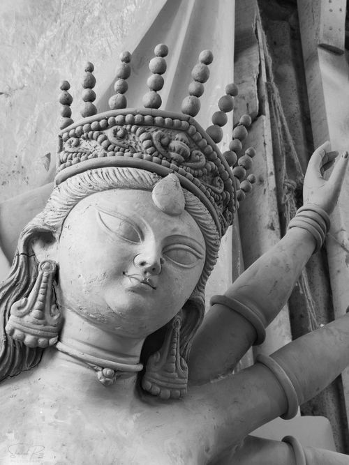 Free Unfinished clay idol of Goddess Durga in Kumartuli, Kolkata, showcasing craftsmanship. Stock Photo