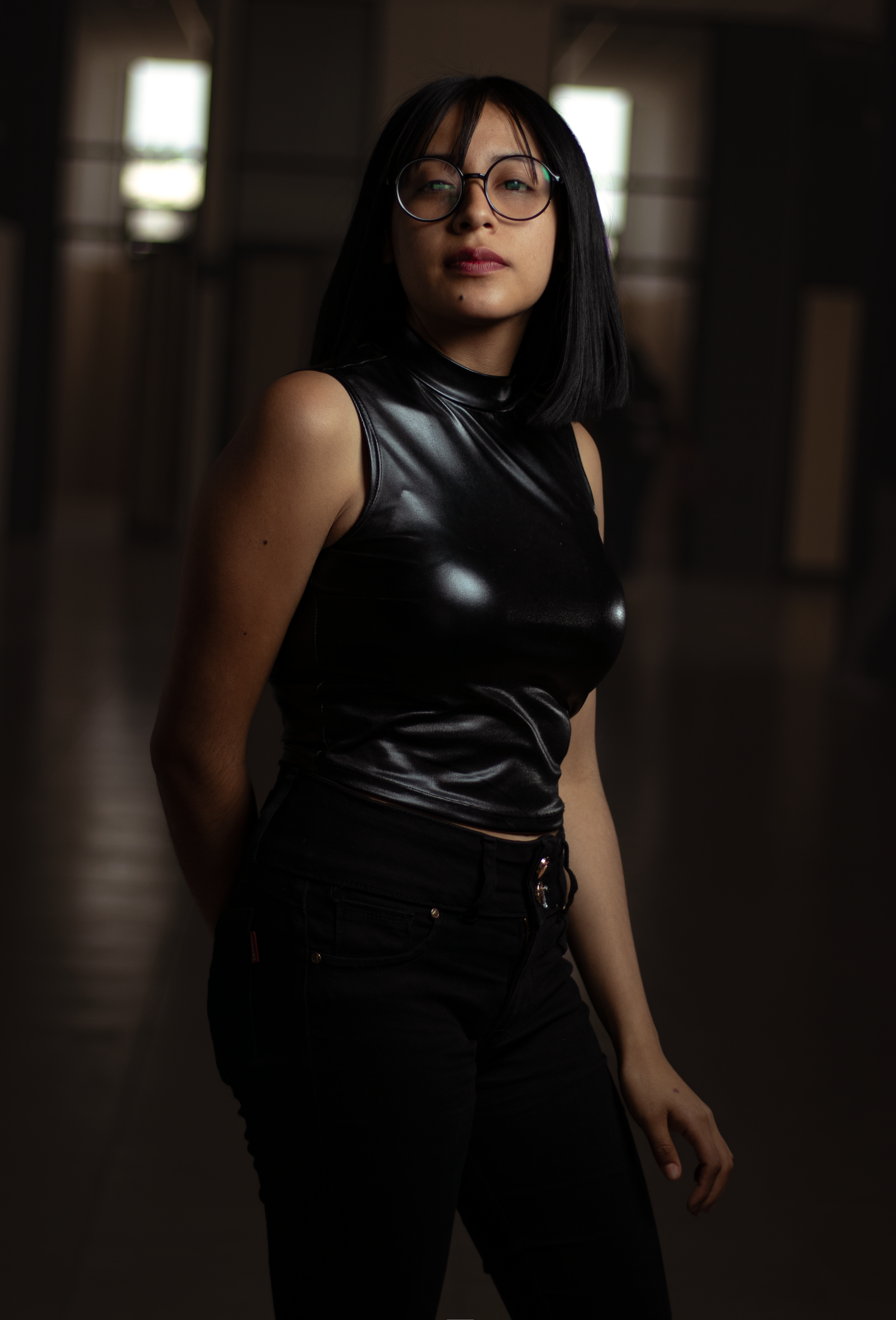 Portrait of Stylish Woman in Black Attire Indoors · Free Stock Photo