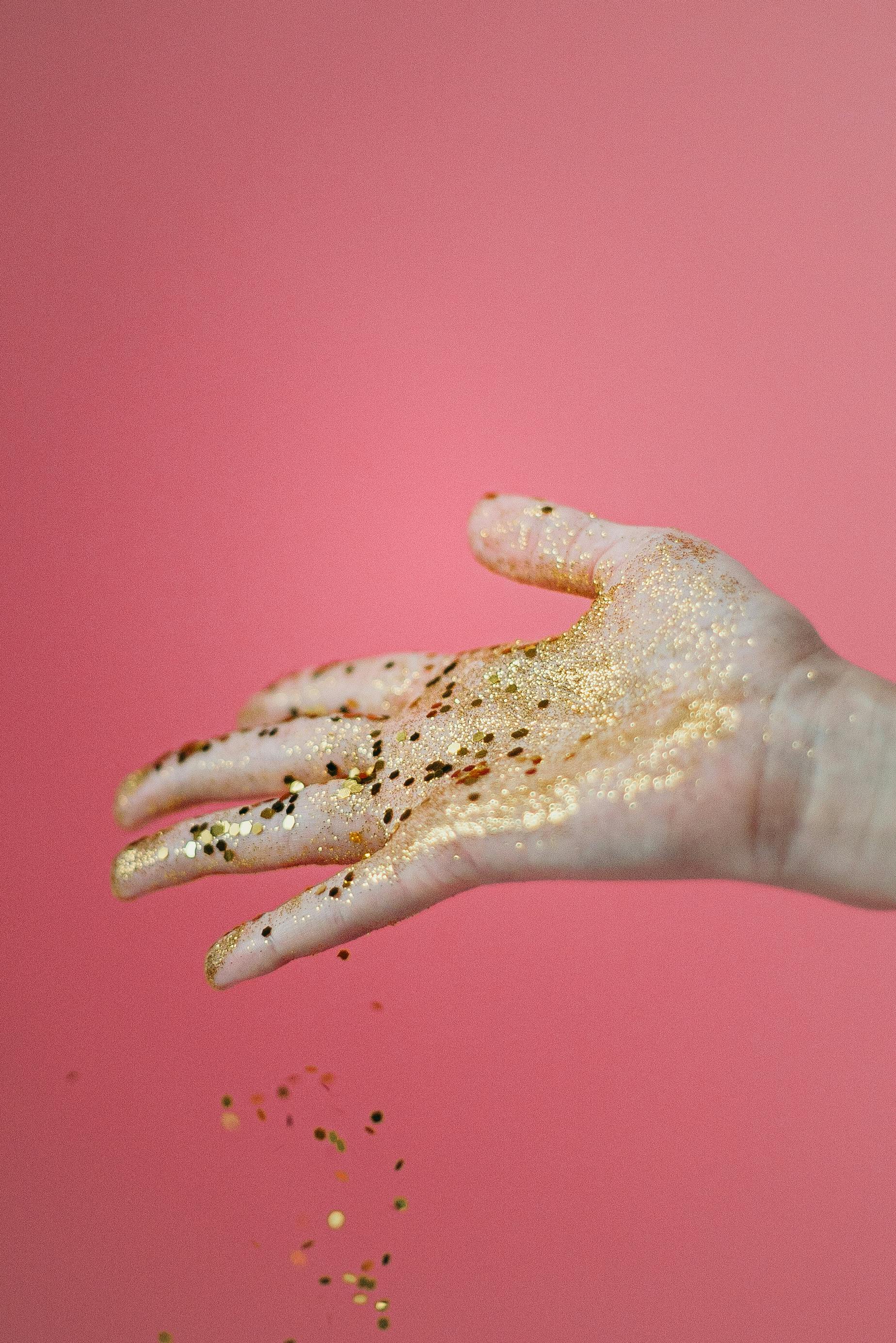 right palm with gold glitters