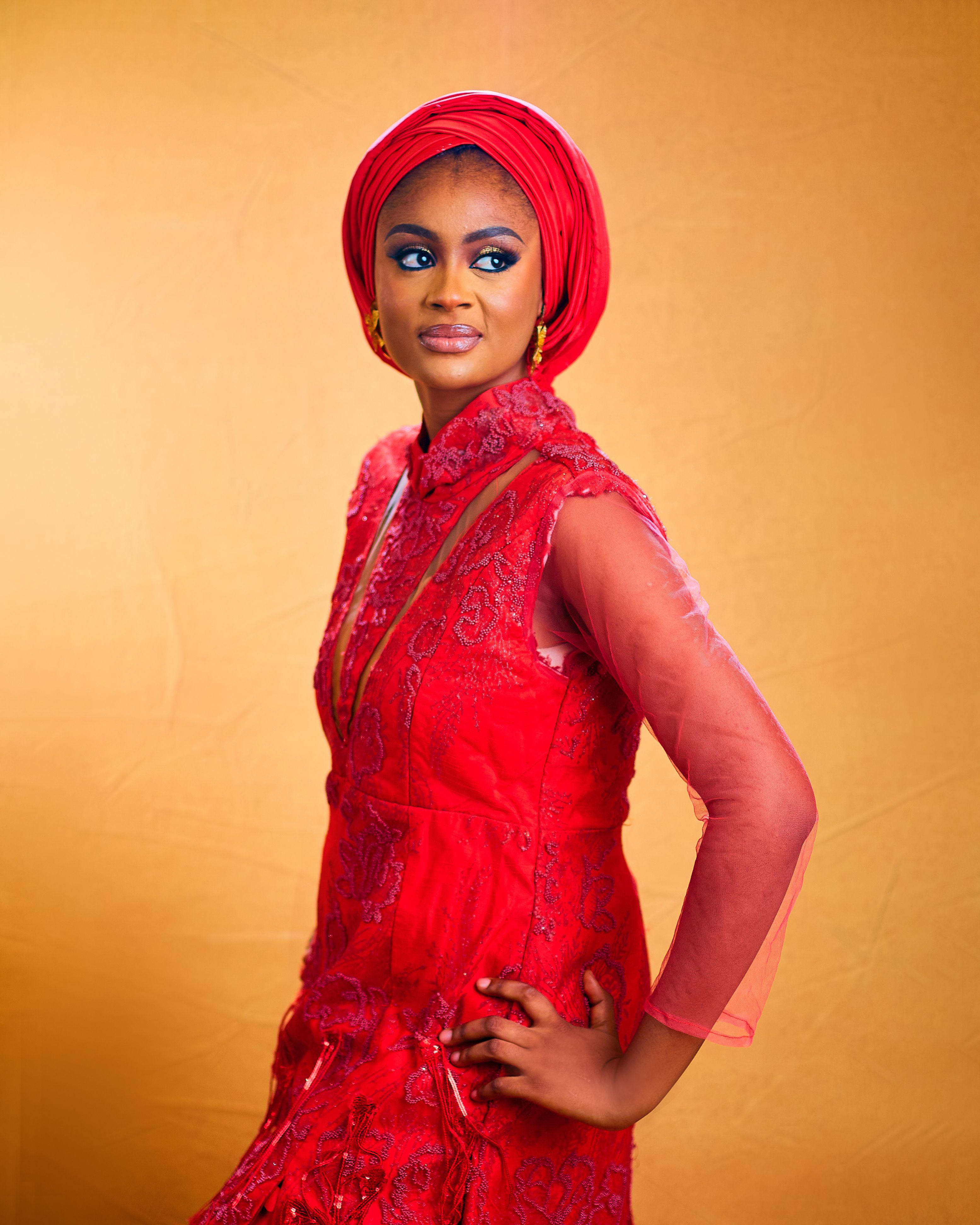 Elegant Woman in Traditional Red Attire · Free Stock Photo