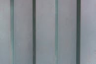 Close-Up of Textured Metal Surface with Shadows