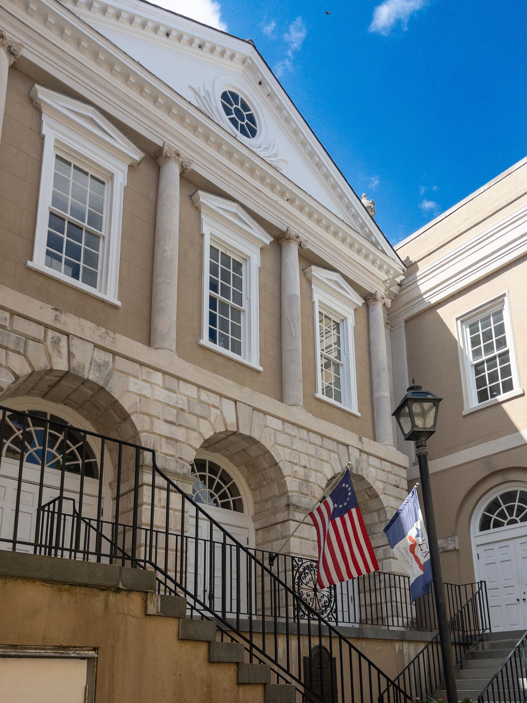 Historic building facade in Charleston, South Carolina, illustrating the exterior materials and features evaluated in a building condition assessment.