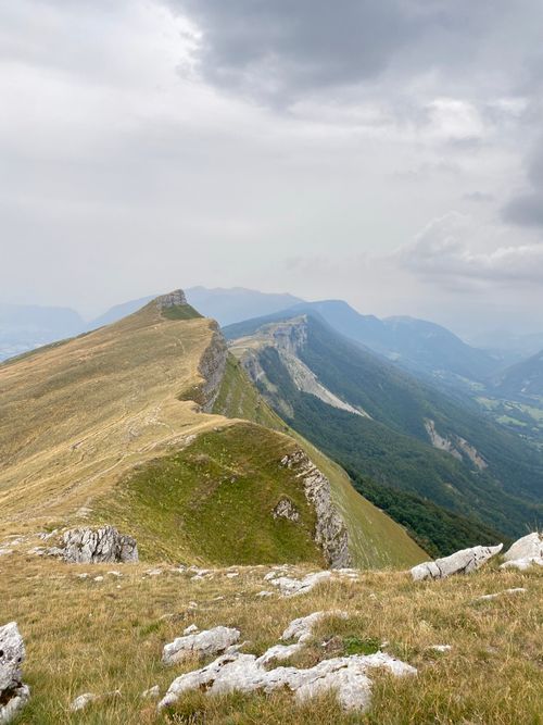 Free Breathtaking view of the French Alps ridge under cloudy skies, perfect for adventure lovers. Stock Photo