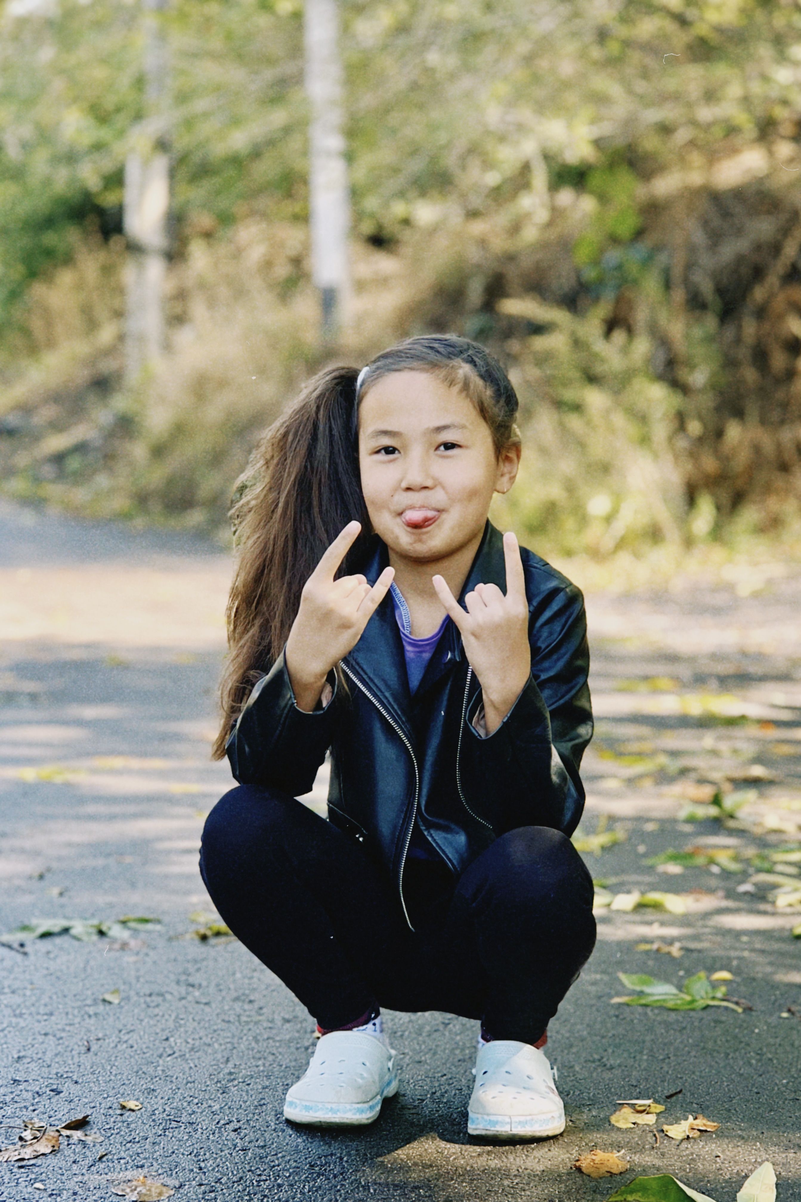 Portrait of a Girl in Leather Jacket Outdoors · Free Stock Photo