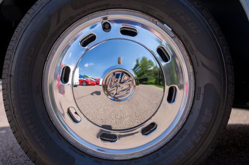 Free Reflective chrome wheel capturing a vibrant outdoor scene in Nelson, Wisconsin. Stock Photo
