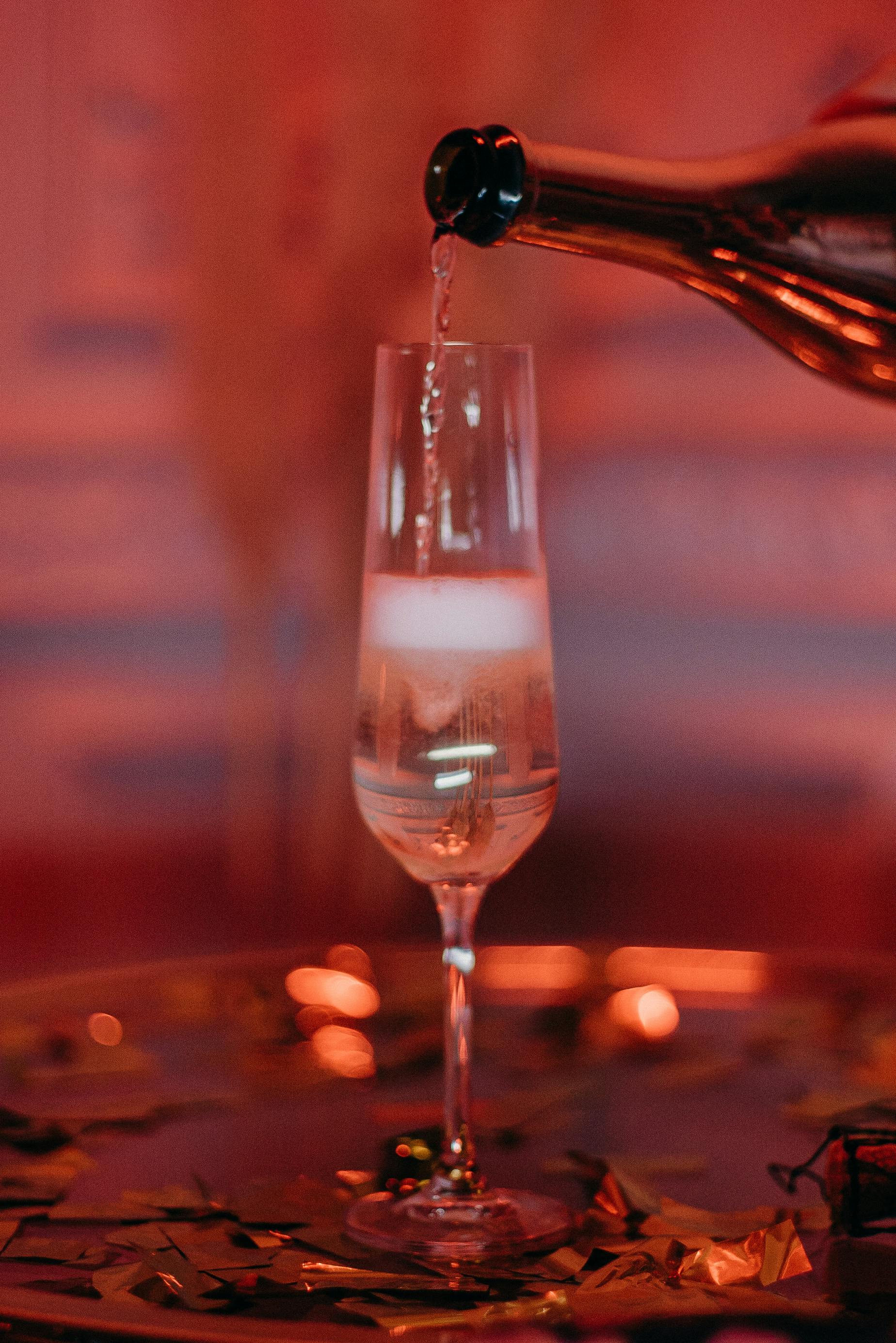 half filled champagne flute glass