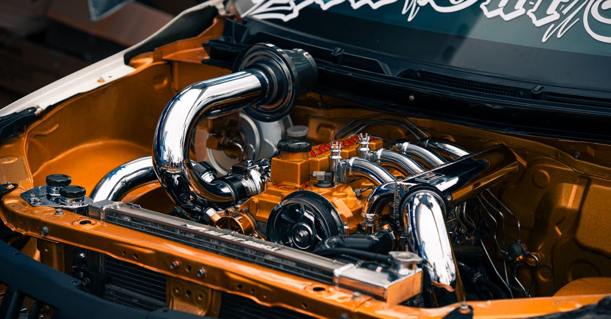 Chrome Detailed Engine in Custom Car · Free Stock Photo