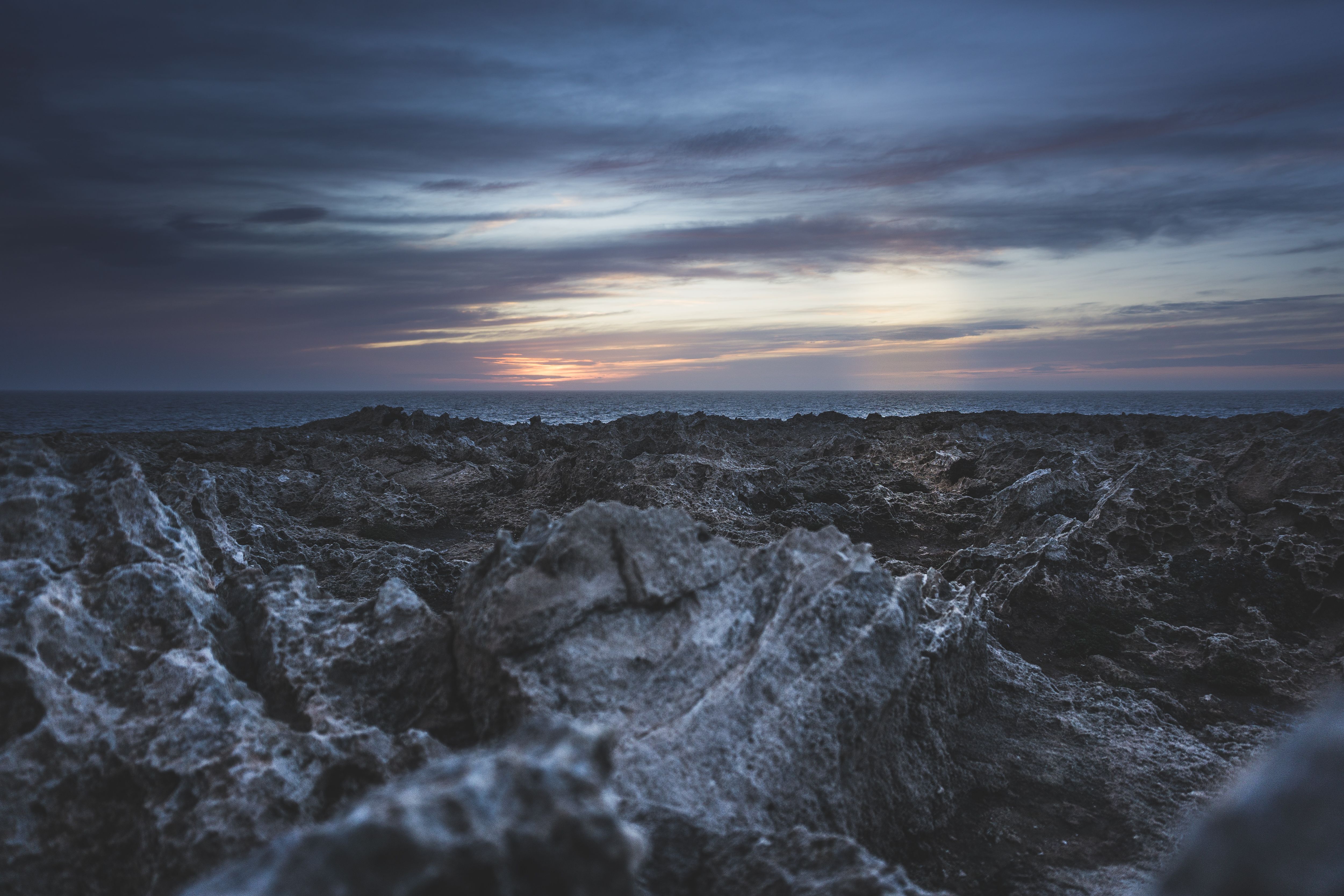 Dramatic Rocky Coastline at Sunset · Free Stock Photo