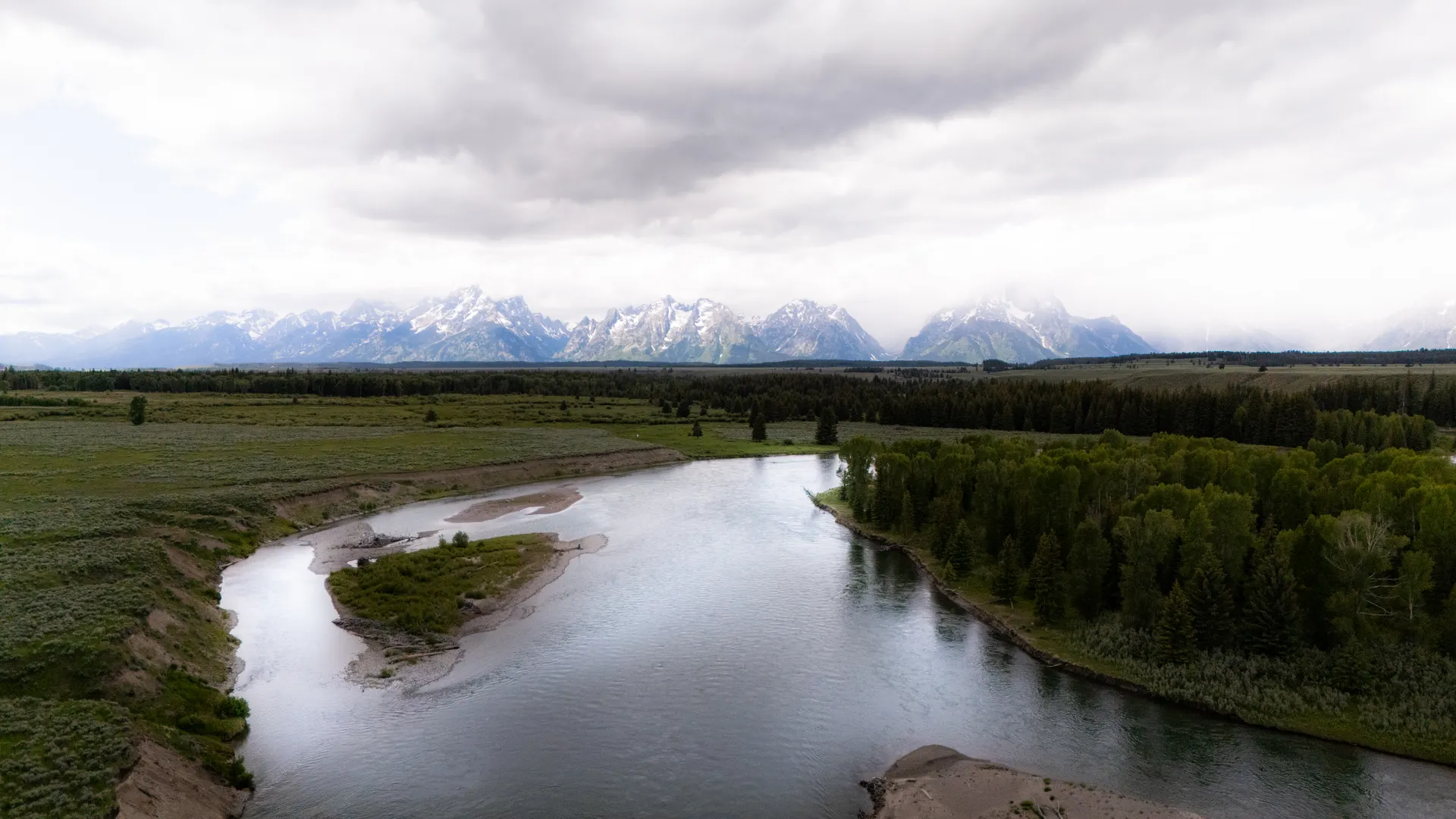 The Teton range rising above the Snake River north of Jackson, Wyoming The Teton range rising above the Snake River north of Jackson, Wyoming