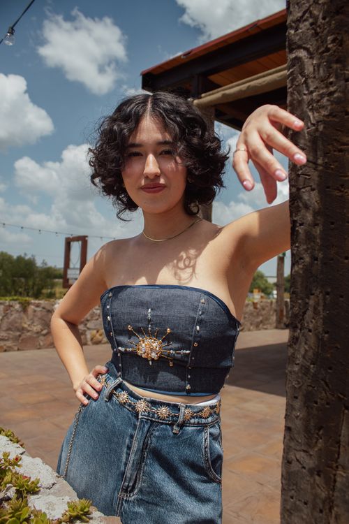 Free A stylish woman poses outdoors in Querétaro, showcasing designer fashion under clear skies. Stock Photo