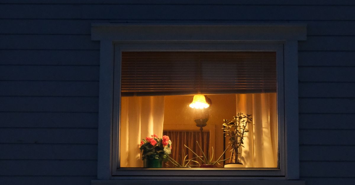 Evening Window Pattern Cozy Evening Glimpse Through Illuminated Window · Free Stock Photo