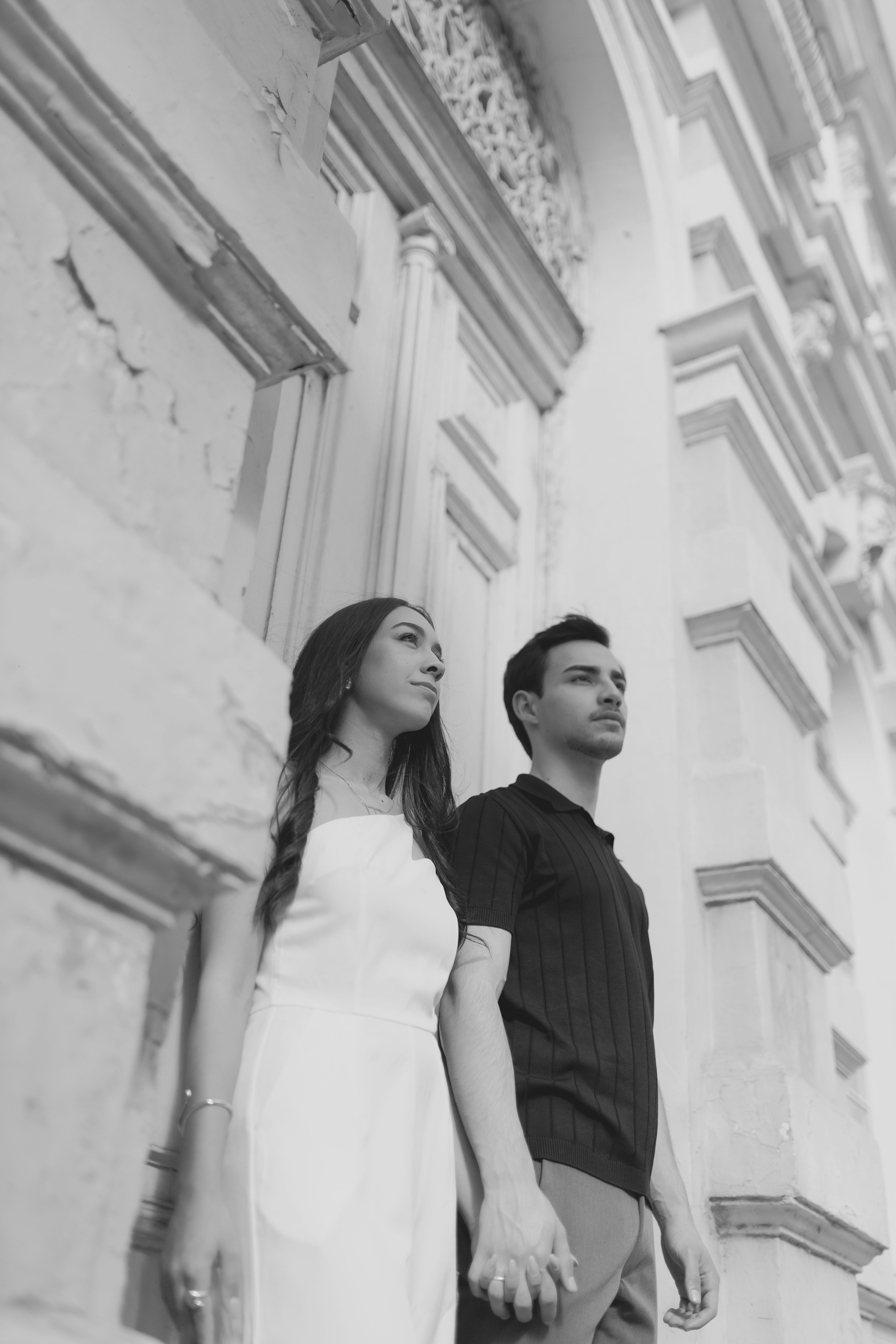 Black and White Couple Holding Hands Outdoors · Free Stock Photo