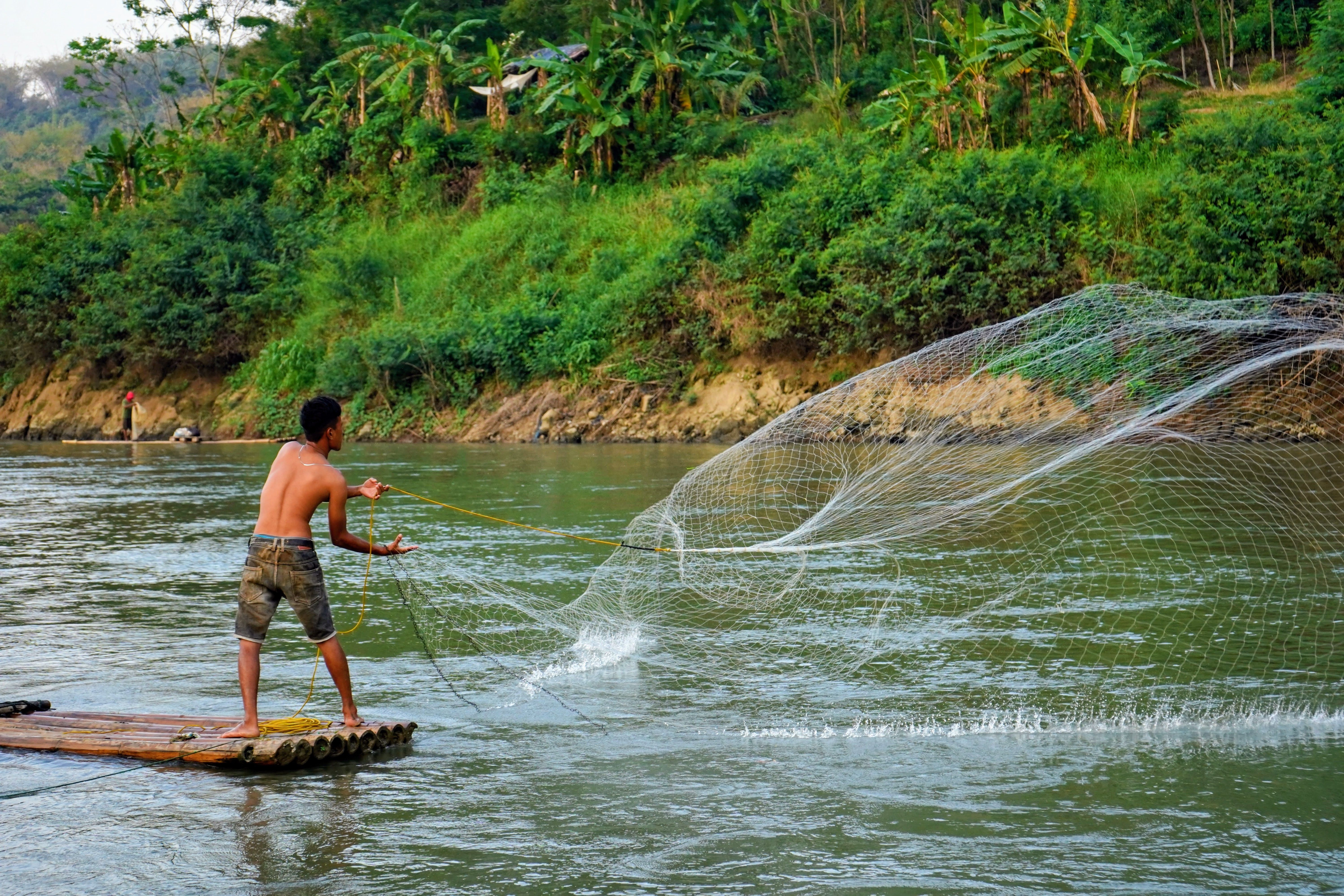 Traditional Fishing on River Raft in West Java · Free Stock Photo