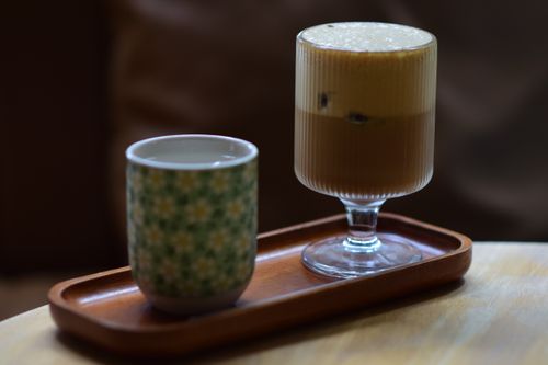 Free Aesthetic coffee and tea served on a wooden tray, perfect for a cozy indoor setting. Stock Photo